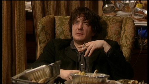Bernard Black (Dylan Moran) might be happy if he could just smoke...and drink  and read. image credit Assembly Film and Television and Channel 4